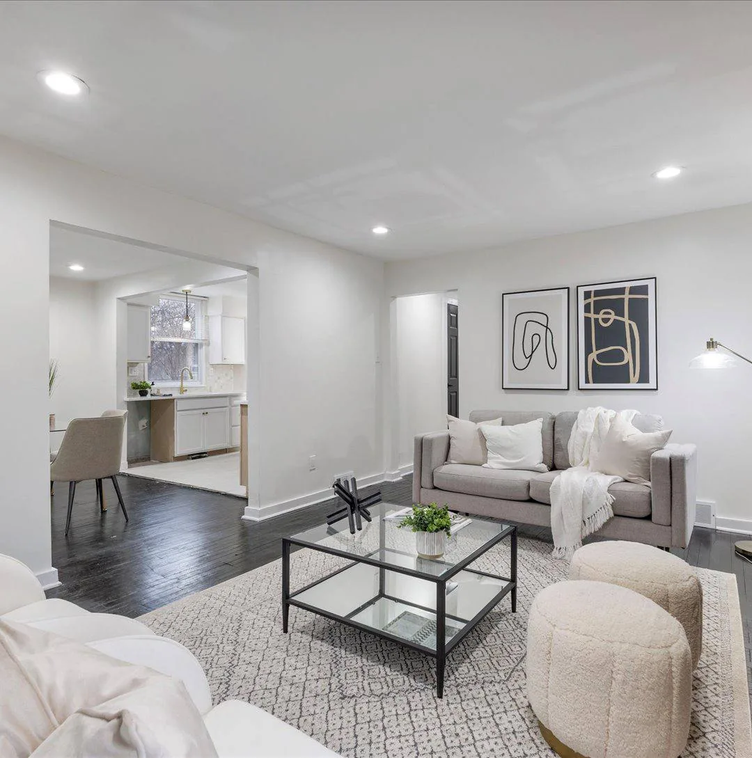 Bright open-concept living room in a renovated investment property